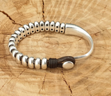 BRACELET CUIR ET ZAMAK ET ARGENT