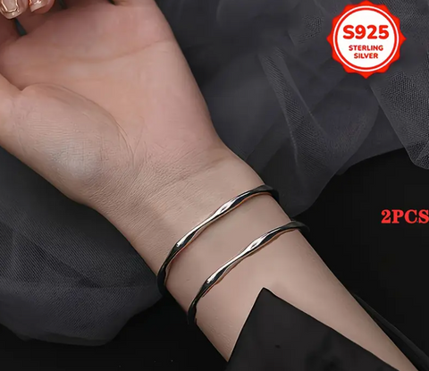 1 PAIRE DE BRACELETS ARGENT