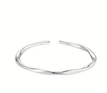 1 PAIRE DE BRACELETS ARGENT