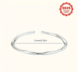1 PAIRE DE BRACELETS ARGENT